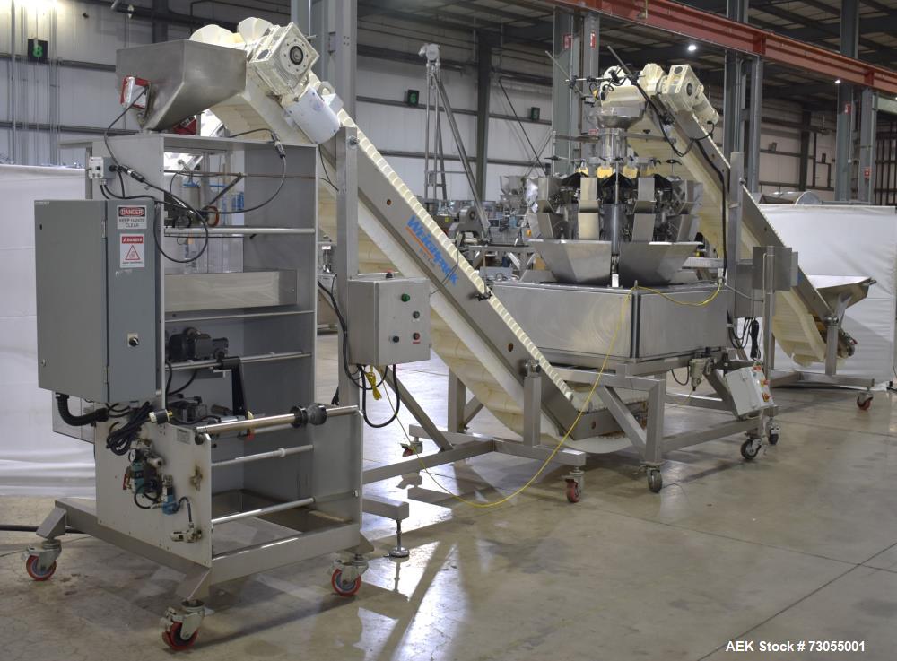 Used- WeighPack Systems Model Vertek 1150 Vertical Form and Fill Machine with 10 Head RadPAk Moderl RW10-C Combination Scale...