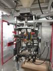 Used Bosch Model SVE2510 Vertical form fill and seal packaging system with Allen-Bradley Control Logix 5555 controls, 14 head Yamato model ADW 414SD dimpled/embossed bucket scale on mild steel platfo...