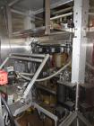 Used Bosch Model SVE2510 Vertical form fill and seal packaging system with Allen-Bradley Control Logix 5555 controls, 14 head Yamato model ADW 414SD dimpled/embossed bucket scale on mild steel platfo...