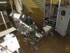 Used Hayssen Model 300E Vertical form fill and seal packaging system. Complete line includes with Ishida 16 head dimpled/embossed bucket scale  , Allen-Bradley Compact Logix L31 controls,  mild steel...