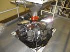 Used Hayssen Model 300E Vertical form fill and seal packaging system. Complete line includes with Ishida 16 head dimpled/embossed bucket scale  , Allen-Bradley Compact Logix L31 controls,  mild steel...