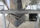 Used Hayssen Ultima 8-16 HPR Twin Tube VFFS Bagger with Ishida 16 Head Scale