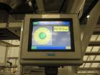 Used Hayssen Ultima Ultra 13-19HR Vertical form fill and seal packaging system. Complete line includes with Ishida 14 head  dimpled/embossed bucket scale and mild steel platform, Allen Bradley SLC 5/...
