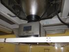 Used Hayssen Ultima Ultra 13-19HR Vertical form fill and seal packaging system. Complete line includes with Ishida 14 head  dimpled/embossed bucket scale and mild steel platform, Allen Bradley SLC 5/...