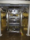 Used Matrix Packaging  Model  201318R  Vertical form fill and seal packaging system. Complete line includes Yamato Adw-714sv scale  dimpled/embossed bucket scale and  Allen-Bradley Micrologix 1500 an...