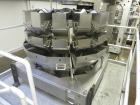 Used Matrix Packaging  Model  201318R  Vertical form fill and seal packaging system. Complete line includes Yamato Adw-714sv scale  dimpled/embossed bucket scale and  Allen-Bradley Micrologix 1500 an...