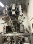 Buy Ohlson (Nvenia) VFFS Packaging Line – Scale, Conveyor, Print Registration, Rotary Table