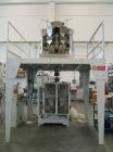 Used-Simionato Packaging Line comprisin of one multihead weigher,  one platform, one VFFS machine.  Including one forming tu...