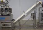 Used- WeighPack Systems Model Vertek 1150 Vertical Form and Fill Machine with 10 Head RadPAk Moderl RW10-C Combination Scale...