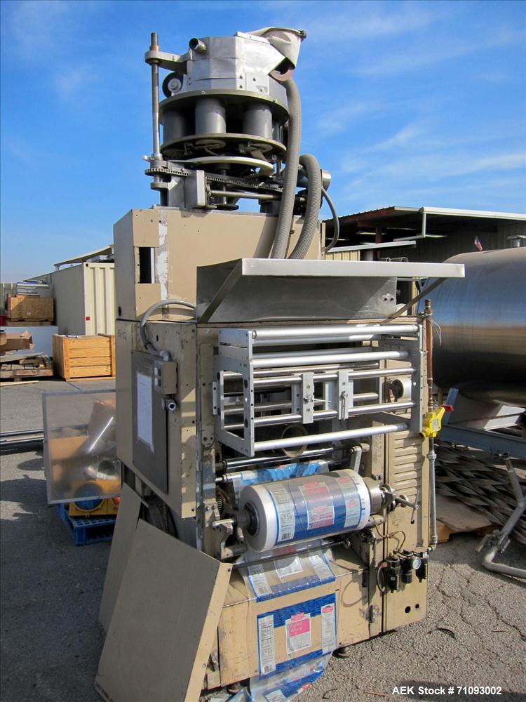 Used Transwrap Model S-750 Vertical Form Fill and Seal Machine. Includes top-mounted volumetric feeder. Has a 24" web width, a 4-1/2" (diameter) tube. Includes (3) forming tubes. (OAD: 61"L X 55"W X ...