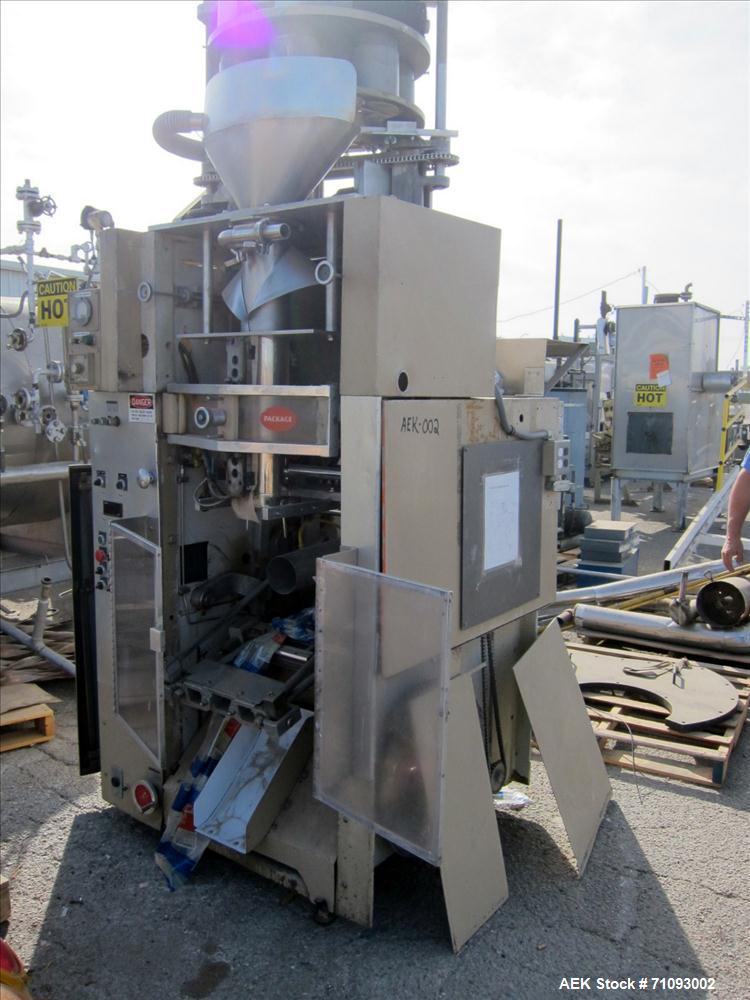 Used Transwrap Model S-750 Vertical Form Fill and Seal Machine. Includes top-mounted volumetric feeder. Has a 24" web width, a 4-1/2" (diameter) tube. Includes (3) forming tubes. (OAD: 61"L X 55"W X ...