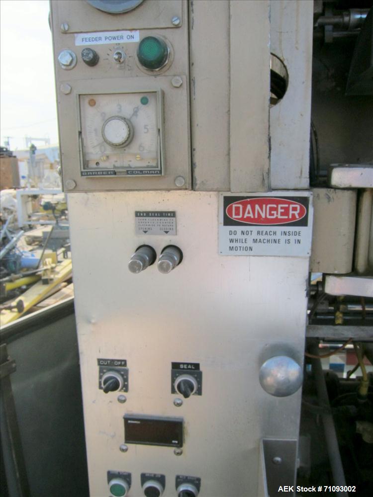 Used Transwrap Model S-750 Vertical Form Fill and Seal Machine. Includes top-mounted volumetric feeder. Has a 24" web width, a 4-1/2" (diameter) tube. Includes (3) forming tubes. (OAD: 61"L X 55"W X ...