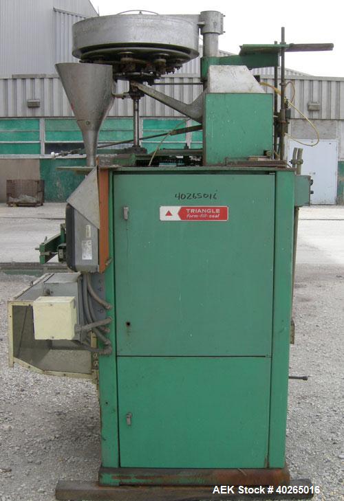 Used Triangle Package Machinery Single Tube Volumetric Vertical Form Fill and Seal Machine, model L5C. Capable of speeds up to 60 bpm. Bag size range: width 3" to 9", length 3" to 14". Has 10" wide s...