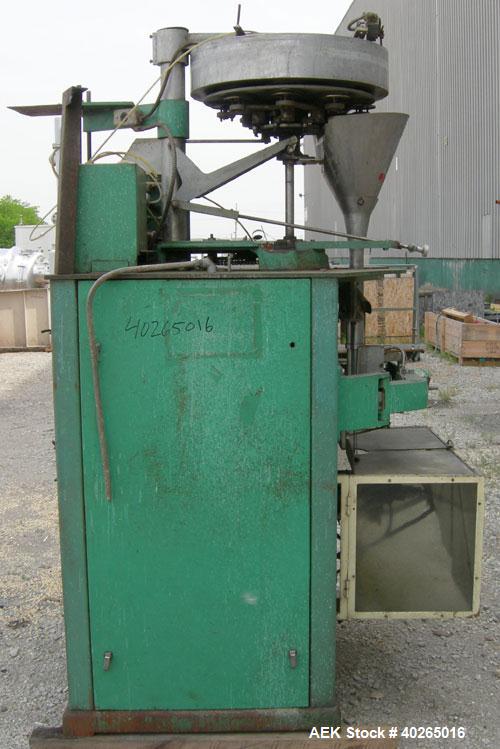 Used Triangle Package Machinery Single Tube Volumetric Vertical Form Fill and Seal Machine, model L5C. Capable of speeds up to 60 bpm. Bag size range: width 3" to 9", length 3" to 14". Has 10" wide s...