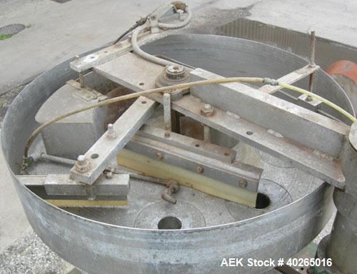 Used Triangle Package Machinery Single Tube Volumetric Vertical Form Fill and Seal Machine, model L5C. Capable of speeds up to 60 bpm. Bag size range: width 3" to 9", length 3" to 14". Has 10" wide s...