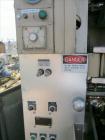 Used Transwrap Model S-750 Vertical Form Fill and Seal Machine. Includes top-mounted volumetric feeder. Has a 24