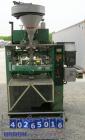Used Triangle Package Machinery Single Tube Volumetric Vertical Form Fill and Seal Machine, model L5C. Capable of speeds up to 60 bpm. Bag size range: width 3