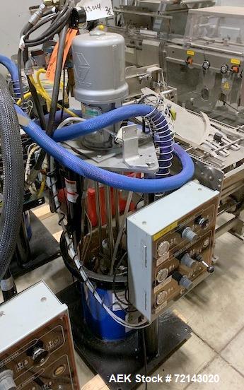 Used Graco Thermo-O-Flow 20 Air-Powered Ram Heated Pail Unloader. 5 Gallon (20 liter) pail size. Approximate 3" (76mm) diameter dual post ram. Approximate maximum melt rate 0.6 kg/min (1.3lb/min), ma...