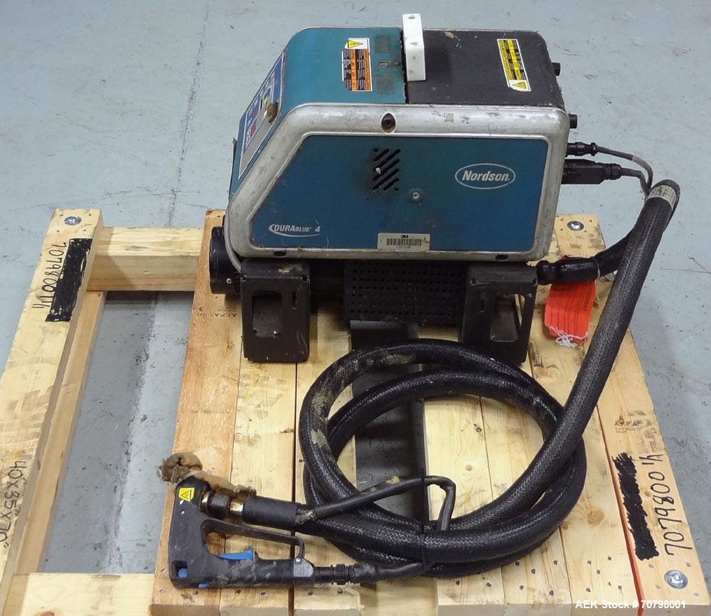 Used Nordson Model Durablue 4 Hot Melt Glue Unit. Has a 4-liter glue tank capacity. Has an output rating of up to 13.9lbs per hour with a melt rate of 10.3lbs per hour. Currently set up with (1) hose...