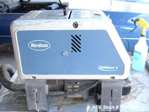 Used Nordson Durablue 4 Hot Melt Glue System.  Has a single hose and hand held gun.  Last used in a foam operation.