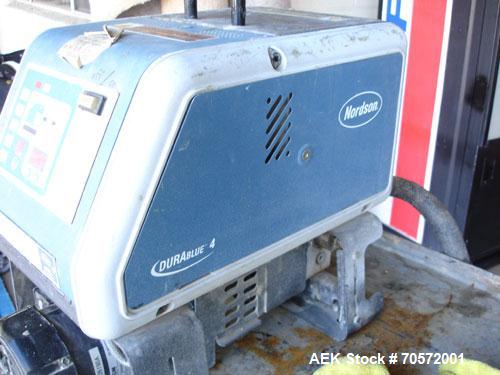 Used Nordson Durablue 4 Hot Melt Glue System.  Has a single hose and hand held gun.  Last used in a foam operation.