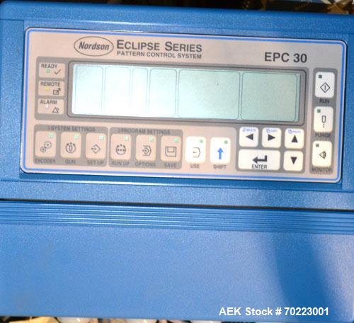 Used Nordson Hot Melt Adhesive Applicator System, Model Problue 10. Volume 10 liter, hmelt rate per hour 24 pound, throughput per hour 27.3 pound. Includes a PS40 Nordson power supply, and an Eclipse...
