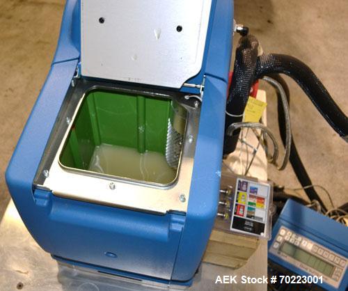 Used Nordson Hot Melt Adhesive Applicator System, Model Problue 10. Volume 10 liter, hmelt rate per hour 24 pound, throughput per hour 27.3 pound. Includes a PS40 Nordson power supply, and an Eclipse...