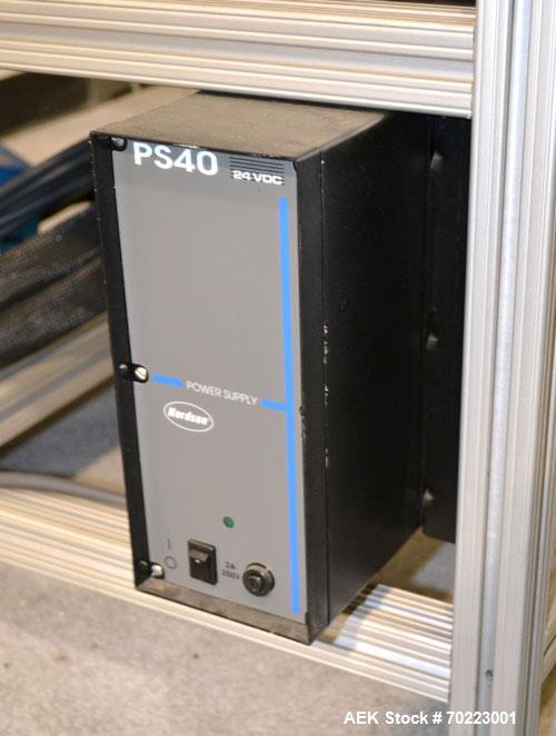 Used Nordson Hot Melt Adhesive Applicator System, Model Problue 10. Volume 10 liter, hmelt rate per hour 24 pound, throughput per hour 27.3 pound. Includes a PS40 Nordson power supply, and an Eclipse...
