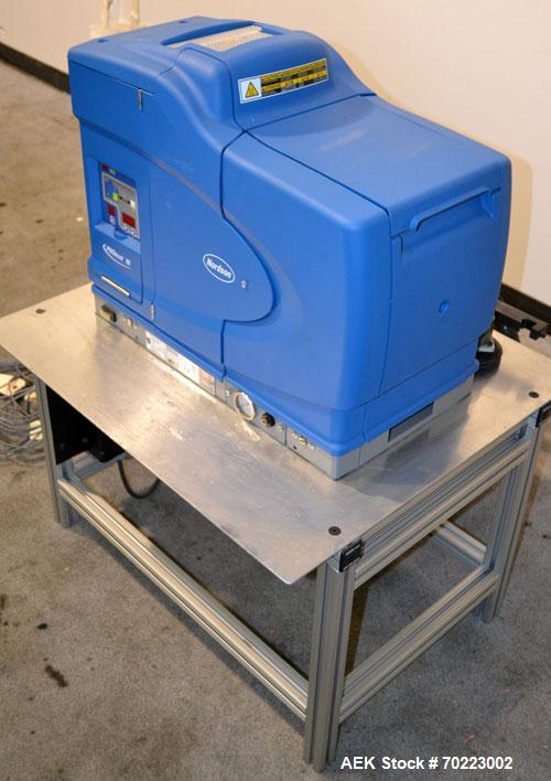 Used Nordson Hot Melt Adhesive Applicator System, Model Problue 10. Volume 10 liter, hmelt rate per hour 24 pound, throughput per hour 27.3 pound. Includes a PS40 Nordson power supply, and an Eclipse...