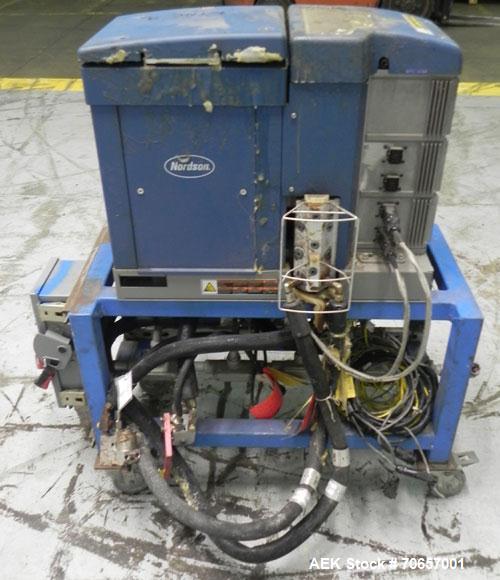 Used Nordson Model ProBlue 15 Hot Melt Glue System. Has Nodson model EPC 30 Eclipse series pattern controller. Has LogiComm glue gun driver. Mounted on stand alone frame with casters. Includes glue h...