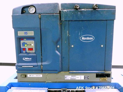 Used Nordson Model ProBlue 15 Hot Melt Glue System. Has Nodson model EPC 30 Eclipse series pattern controller. Has LogiComm glue gun driver. Mounted on stand alone frame with casters. Includes glue h...