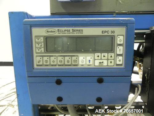 Used Nordson Model ProBlue 15 Hot Melt Glue System. Has Nodson model EPC 30 Eclipse series pattern controller. Has LogiComm glue gun driver. Mounted on stand alone frame with casters. Includes glue h...