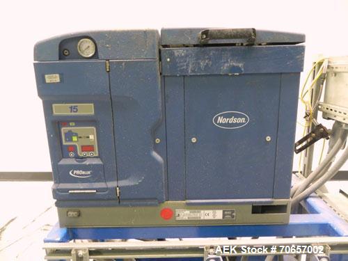 Used Nordson Model ProBlue 15 Hot Melt Glue System. Has Nodson model EPC 30 Eclipse series pattern controller. Has LogiComm glue gun driver. Mounted on stand alone frame with casters. Includes glue h...