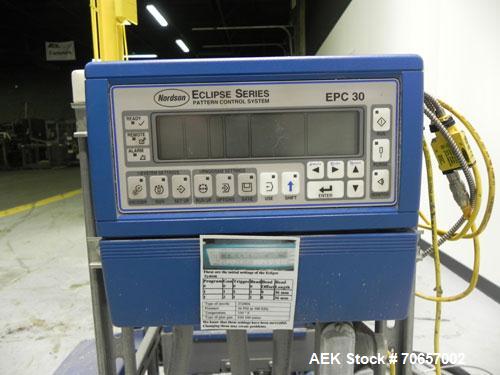 Used Nordson Model ProBlue 15 Hot Melt Glue System. Has Nodson model EPC 30 Eclipse series pattern controller. Has LogiComm glue gun driver. Mounted on stand alone frame with casters. Includes glue h...