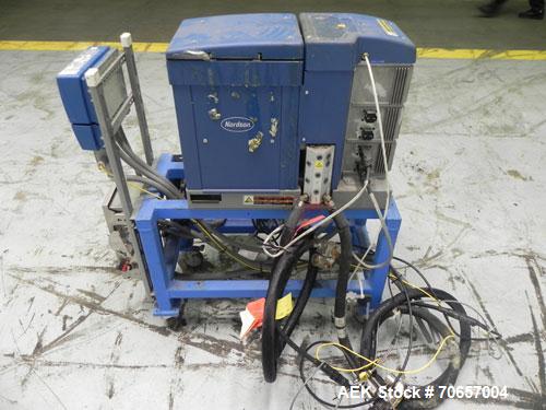 Used Nordson Model ProBlue 15 Hot Melt Glue System. Has Nodson model EPC 30 Eclipse series pattern controller. Has LogiComm glue gun driver. Mounted on stand alone frame with casters. Includes glue h...