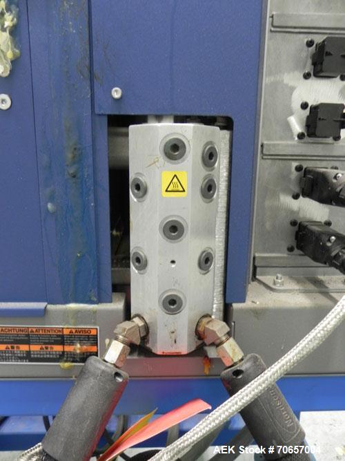 Used Nordson Model ProBlue 15 Hot Melt Glue System. Has Nodson model EPC 30 Eclipse series pattern controller. Has LogiComm glue gun driver. Mounted on stand alone frame with casters. Includes glue h...