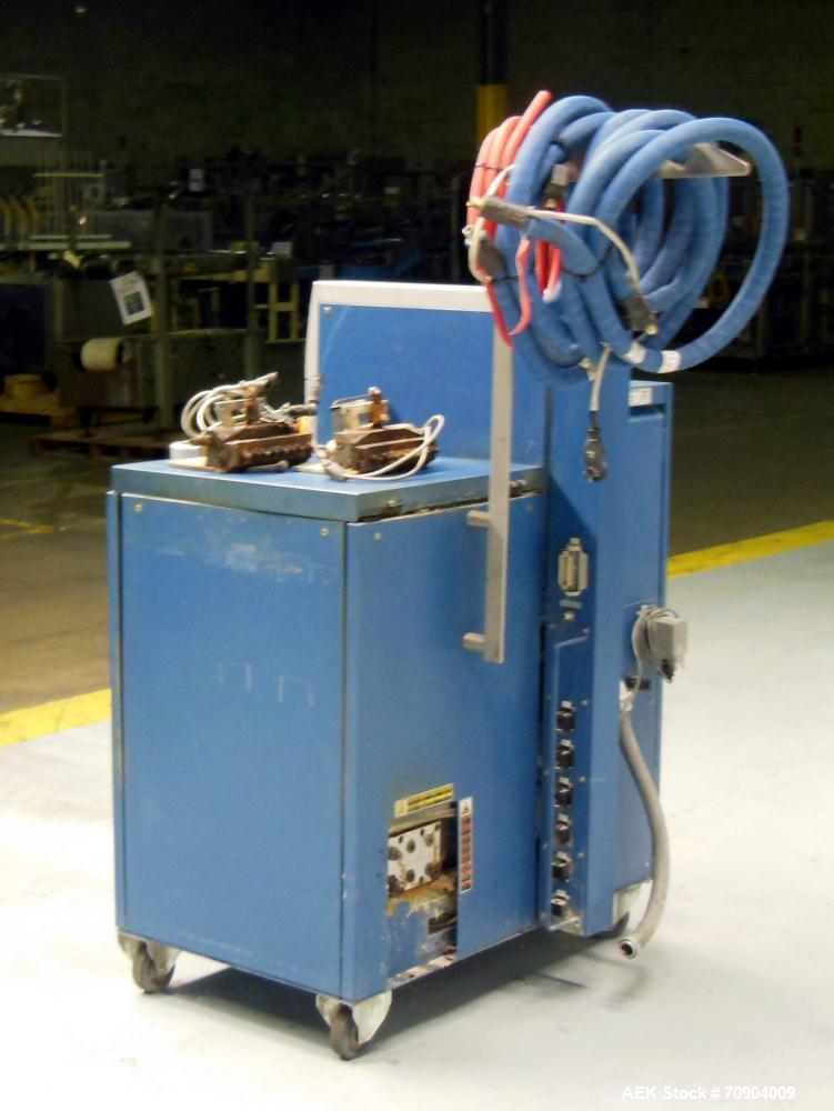 Used Nordson VersaBlue 50 Glue System. Built 2004. Has a holding capacity of 50 Liters, Maximum 6 hoses/guns, throughput per hour 165 lbs (75kg), Melt Rate per hour 110 lbs (50kg). 3/230V/50/60HZ. Ha...