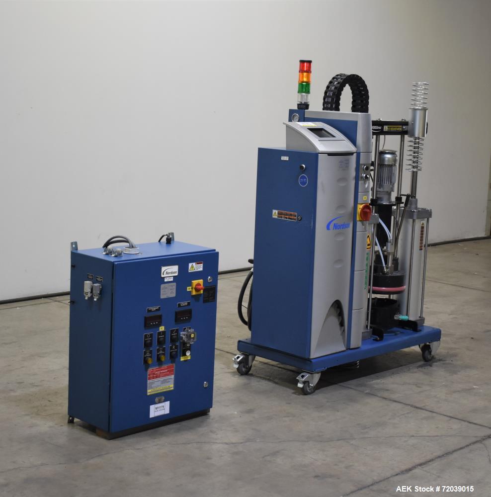 Used Nordson VersaPail Bulk Pail Melter. Model VP020-UN3E4LN/XPAPAWXXCXXXXXXX. 20 Liter or 5 gallon pail capacity, approximate 11.3" diameter. SN0186 Pump rated 8.9 kg/hr (19.6 lbs). Maximum operatin...