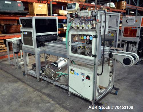 Used PVA (Halfmoon NY) Glue Applicator, serial #C1055, with cooling section. Features twin Rexroth 2” table top chain conveyors which introduce bottle to glue nozzles, then manual “shell/cap” placing...