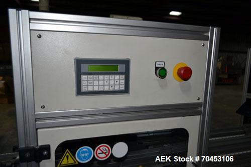 Used PVA (Halfmoon NY) Glue Applicator, serial #C1055, with cooling section. Features twin Rexroth 2” table top chain conveyors which introduce bottle to glue nozzles, then manual “shell/cap” placing...