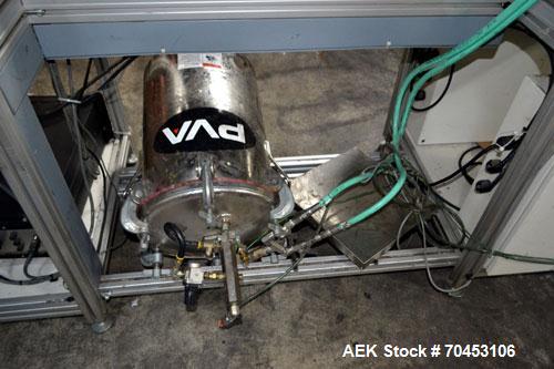 Used PVA (Halfmoon NY) Glue Applicator, serial #C1055, with cooling section. Features twin Rexroth 2” table top chain conveyors which introduce bottle to glue nozzles, then manual “shell/cap” placing...