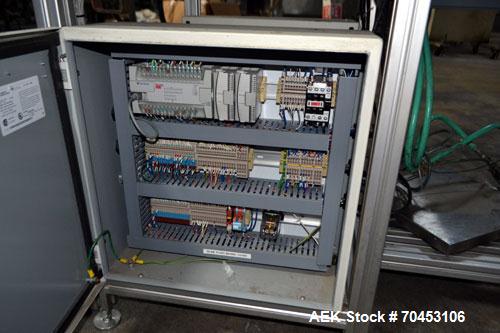 Used PVA (Halfmoon NY) Glue Applicator, serial #C1055, with cooling section. Features twin Rexroth 2” table top chain conveyors which introduce bottle to glue nozzles, then manual “shell/cap” placing...