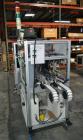 Used PVA (Halfmoon NY) Glue Applicator, serial #C1055, with cooling section. Features twin Rexroth 2” table top chain conveyors which introduce bottle to glue nozzles, then manual “shell/cap” placing...