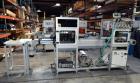 Used PVA (Halfmoon NY) Glue Applicator, serial #C1055, with cooling section. Features twin Rexroth 2” table top chain conveyors which introduce bottle to glue nozzles, then manual “shell/cap” placing...