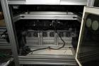Used PVA (Halfmoon NY) Glue Applicator, serial #C1055, with cooling section. Features twin Rexroth 2” table top chain conveyors which introduce bottle to glue nozzles, then manual “shell/cap” placing...