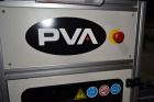 Used PVA (Halfmoon NY) Glue Applicator, serial #C1055, with cooling section. Features twin Rexroth 2” table top chain conveyors which introduce bottle to glue nozzles, then manual “shell/cap” placing...