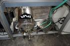 Used PVA (Halfmoon NY) Glue Applicator, serial #C1055, with cooling section. Features twin Rexroth 2” table top chain conveyors which introduce bottle to glue nozzles, then manual “shell/cap” placing...