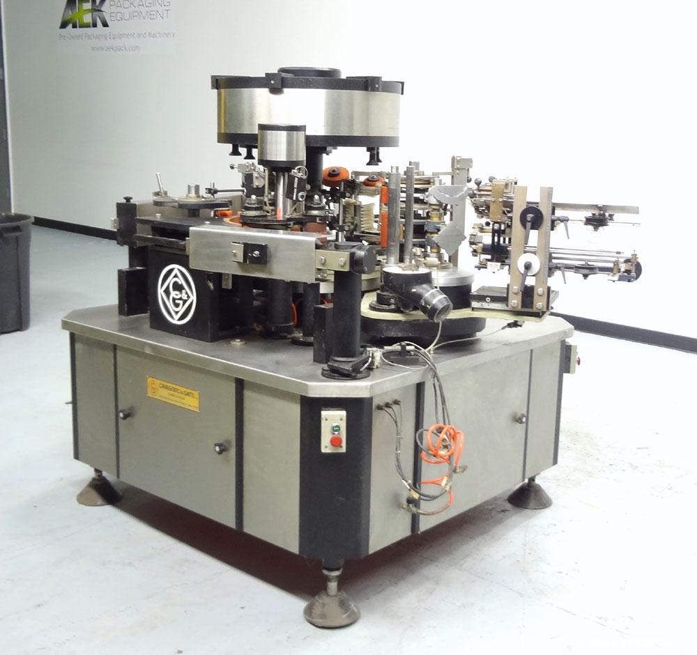 Used Cavagnino & Gatti front back and neck glue labeler. Capable of speeds from 3000 to 8000 bottles per hour. Gluer and Labeler, Series CG84, Model CG84C2/R/7SF C4441, Yr. 1987