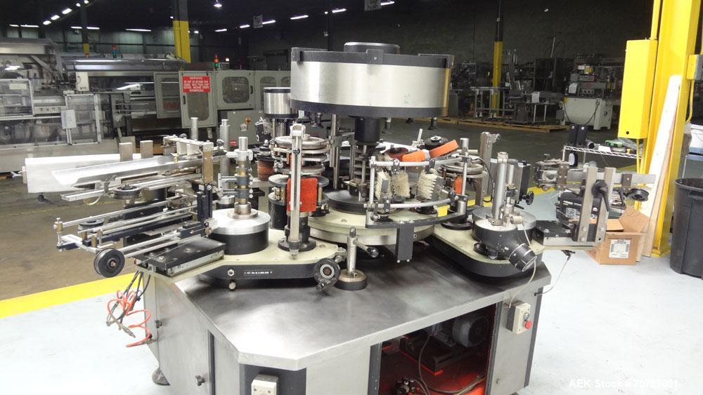 Used Cavagnino & Gatti front back and neck glue labeler. Capable of speeds from 3000 to 8000 bottles per hour. Gluer and Labeler, Series CG84, Model CG84C2/R/7SF C4441, Yr. 1987