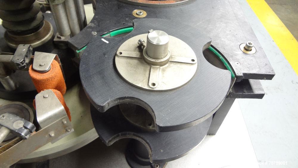 Used Cavagnino & Gatti front back and neck glue labeler. Capable of speeds from 3000 to 8000 bottles per hour. Gluer and Labeler, Series CG84, Model CG84C2/R/7SF C4441, Yr. 1987